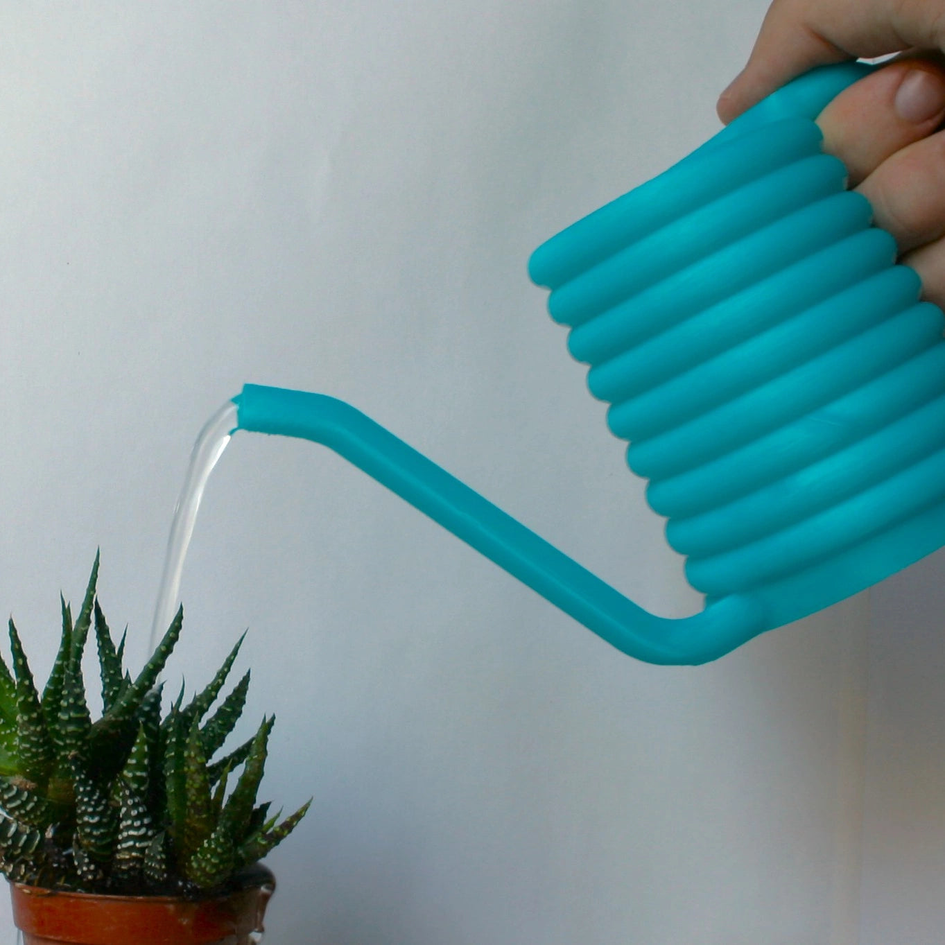 Rope watering can